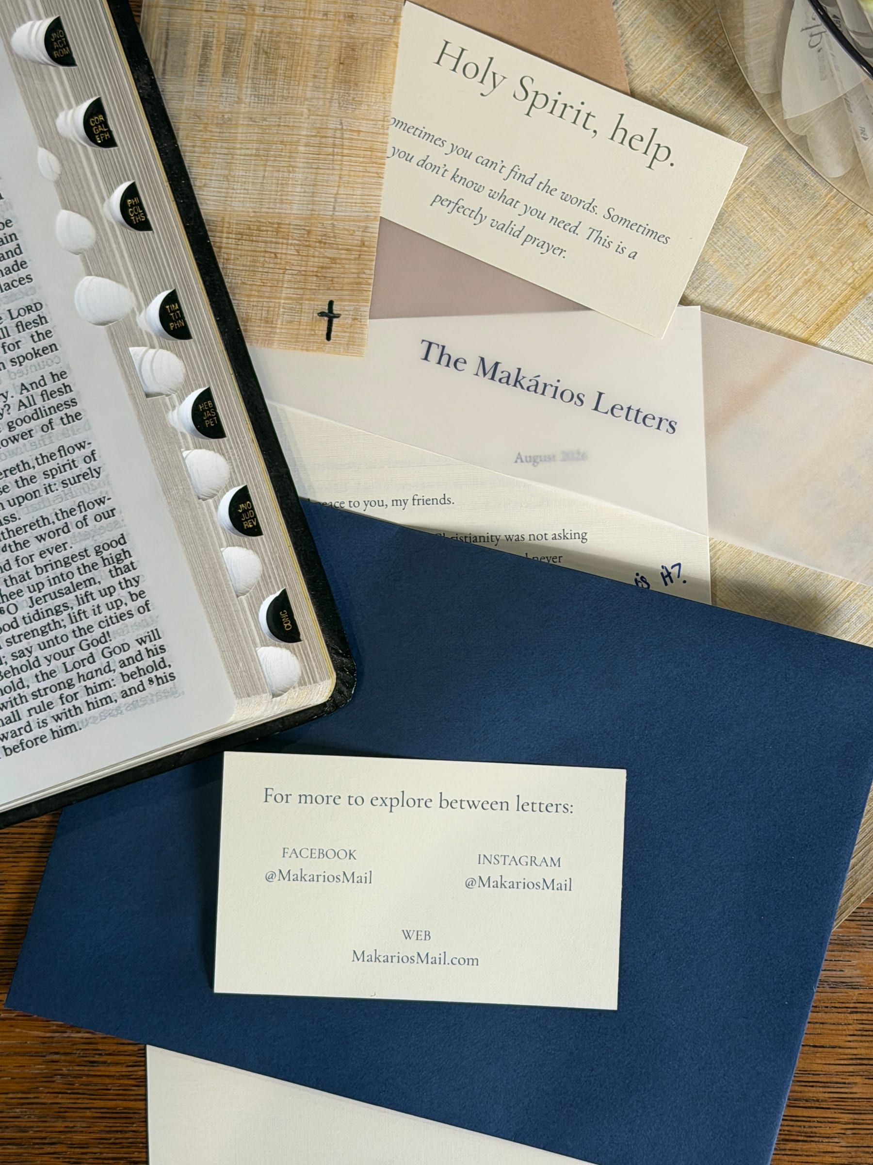 Cards from the envelope: “Holy Spirit, help.”, the letter under vellum, and a card that reads “For more to explore between letters” with @MakariosMail.